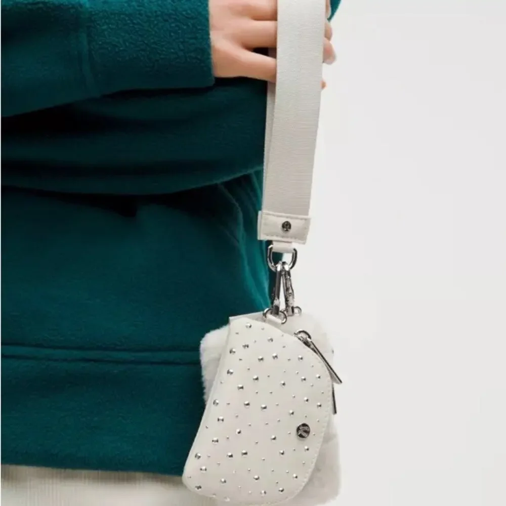 NWT Lululemon Athletica Dual‎ Pouch Wristlet Studded Bone/Silver RARE